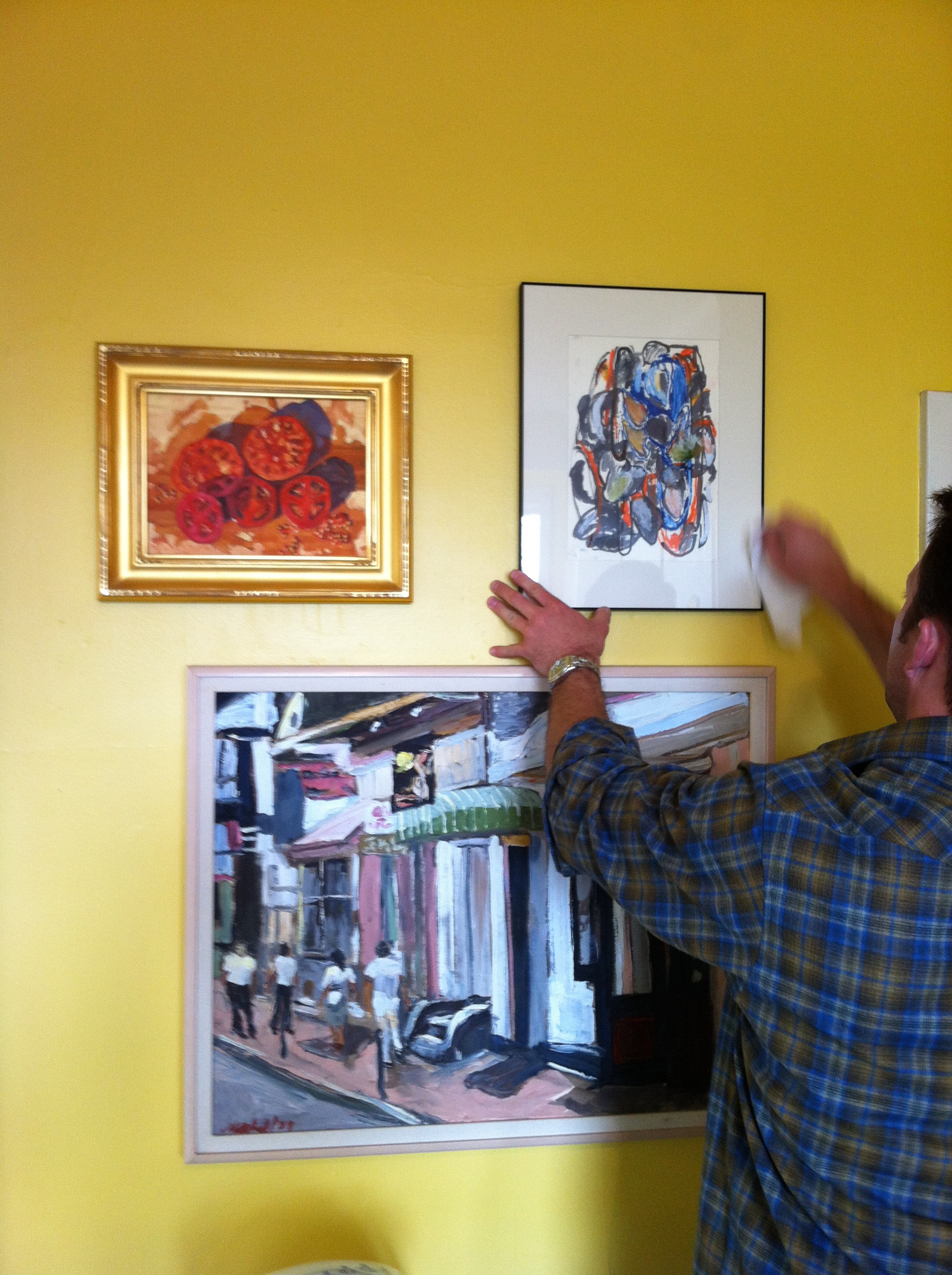 Here my brother hangs Hoshino's Oyster's next to Ziemienski's Tomatoes...above a New Orleans scene Dean bought from an unknown street artist.