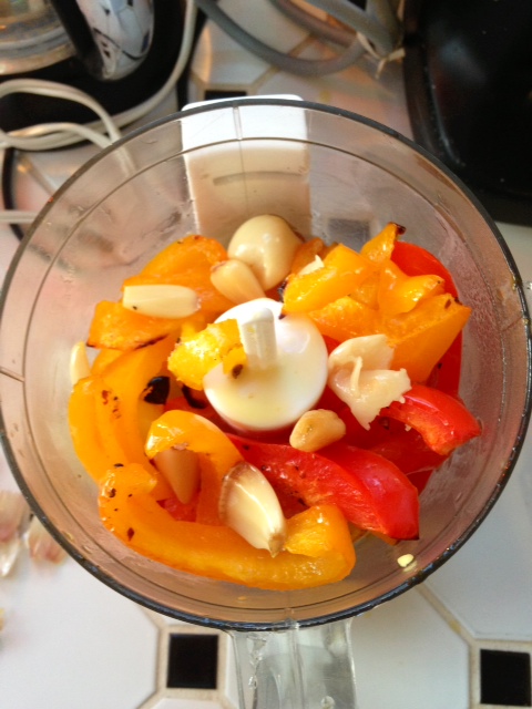Roasted peppers and garlic (sans skins) ready to coarse blend in my trust $26 Cuisinart