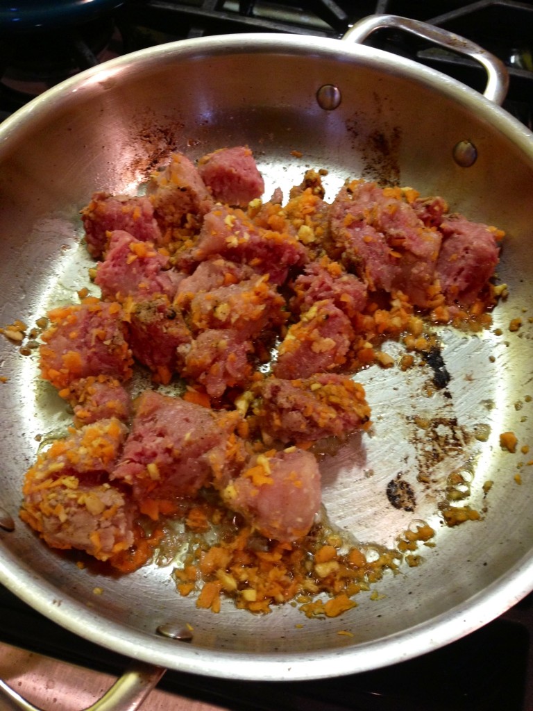 Cooking turkey meat and carrots mixture in about a tablespoon of remaining bacon fat.