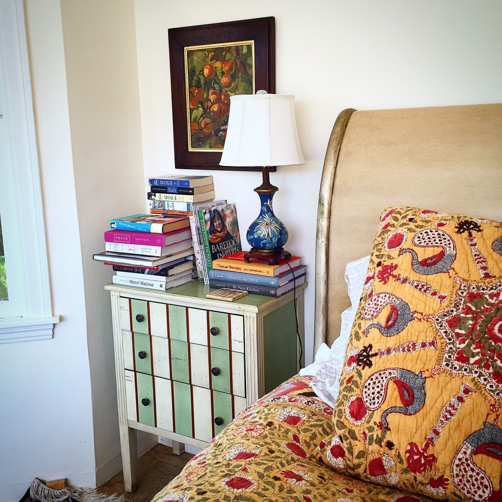 Beauty does not have to be expensive. A peak at my bedside table: a $50 Pier One table, Pottery Barn bed,linens bought on sale and two worthy splurges: "Apricots" by Meredith Abbott and a $150 lamp from the last Pacific Asa Museum Festival of the Autumn Moon